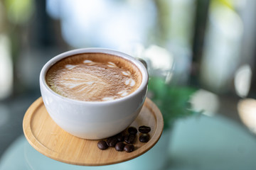 Backgrounds of Latte coffee, Coffee cup latte art in shop.