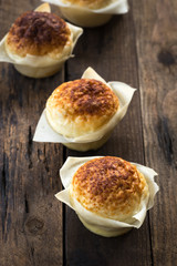 Bun or bread with wood on wood
