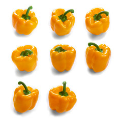 Fresh vegetables yellow sweet peppers isolated on white background