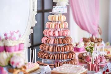 Candy bar with delicious mini cakes, selective focus
