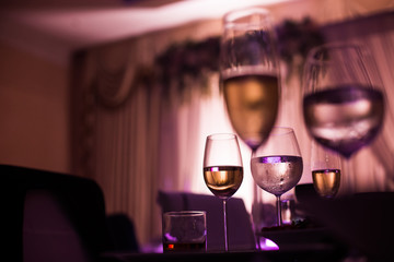 many wine glasses bar brilliance light