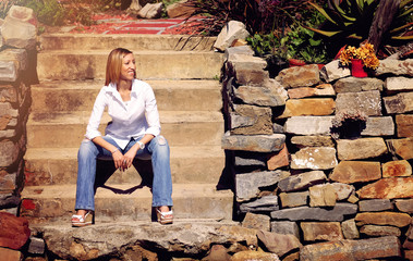 African-American lady in jeans in the garden