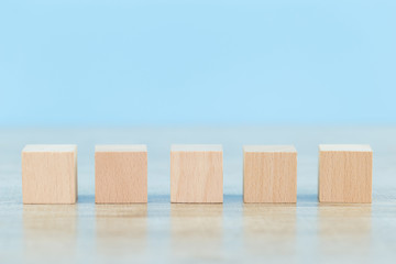 Stacking wooden blocks into steps,Concept of business growth success