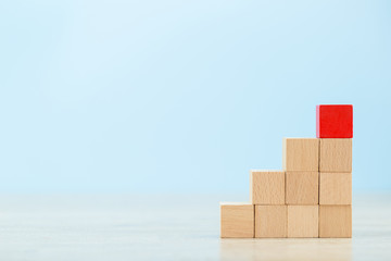 Stacking wooden blocks into steps,Concept of business growth success