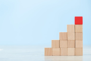Stacking wooden blocks into steps,Concept of business growth success
