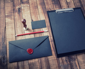 Photo of blank black stationery set on vintage wooden background. Branding template. Mock-up for...