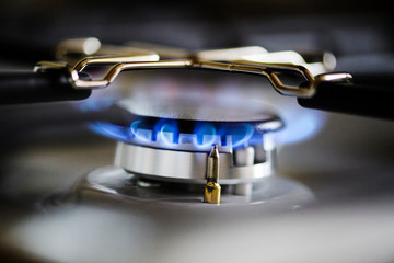Natural gas burning on kitchen gas stove