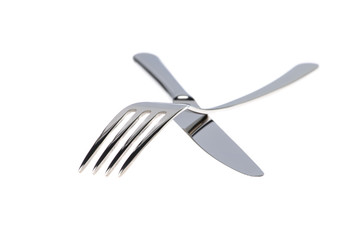 Set of fork, knife and spoons isolated on white.