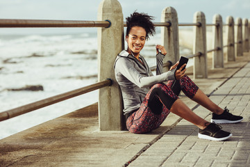 Female runner resting after exercising