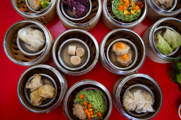 food Chinese dim sum in a bamboo steamer box sphere,Concept:Traditional Asian appetizer culture,Delicious China food festival menu top viw