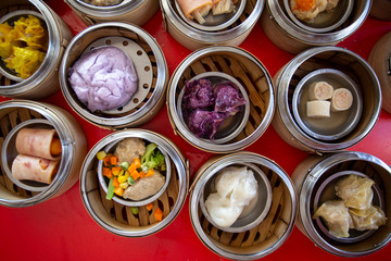 food Chinese dim sum in a bamboo steamer box sphere,Concept:Traditional Asian appetizer culture,Delicious China food festival menu top viw