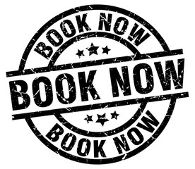 book now round grunge black stamp
