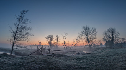 Foggy morning in the valley of the Jeziorka river near Piaseczno, Masovia, Poland
