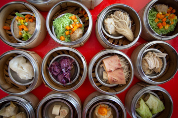food Chinese dim sum in a bamboo steamer box sphere,Concept:Traditional Asian appetizer culture,Delicious China food festival menu top viw