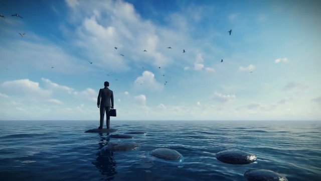 Businessman with briefcase standing on a pebble on a lake surrounded by seagulls