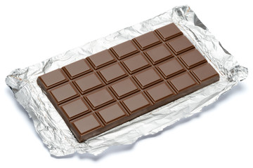 milk chocolate bar covered with foil isolated on white background with clipping path