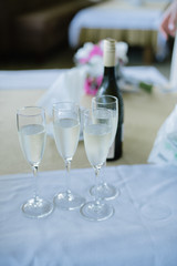 Glasses with champagne on the table