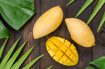 Mango on palm leaves.