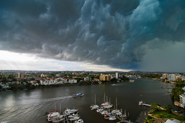 A storm approaches Brisbane city centre, a regular occurence in summer © Alan