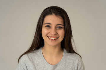 Fototapeta premium Portrait of young attractive cheerful woman with smiling happy face. Human expressions and emotions