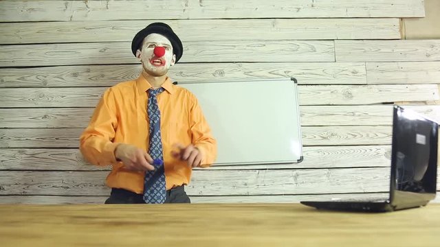 Clown businessman working in the office