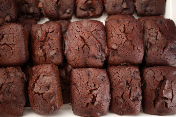 Brownie. A stack of chocolate brownies. Brownie cake or muffin. Homemade bakery and dessert. Homemade chocolate fudge brownie