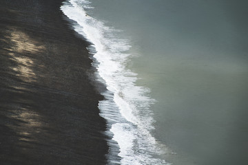 waves crashing on rocks