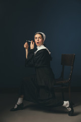 Fototapeta premium Medieval young woman as a nun