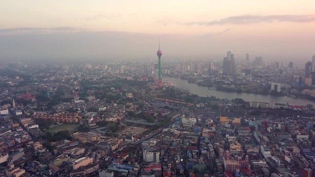 Aerial View drone 4k footage of The City Colombo Capital Of Sri Lanka, lotus tower. sunset