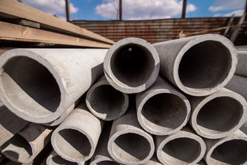 The gray water pipe is lying on each other in rows, building materials