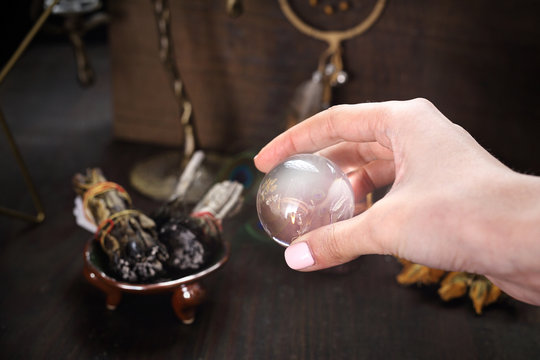 A glass ball, a visit to a fortune teller. The fairy looks to the future.