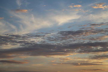Obraz premium Beautiful white clouds in blue sky during sunset