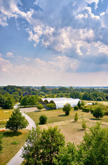 Fototapeta na wymiar Park with modern large greenhouses in Wismar. Mecklenburg-Vorpommern, Germany