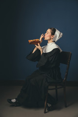 Fototapeta premium Medieval young woman as a nun