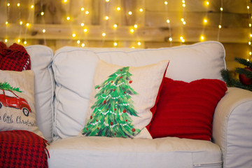 sofa, cushions with a Christmas tree