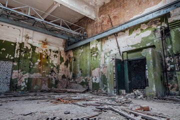 Abandoned industrial building with old bridge crane