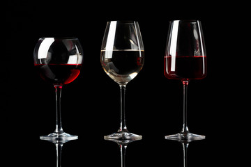 Glasses of red, pink and white wine.