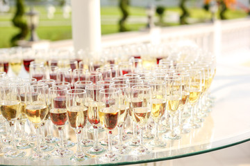 Table full with champagne glasses at a wedding reception