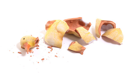 Broken statue of a duckling