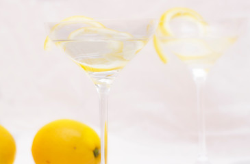 Vesper Cocktail in martini glass decoreted lemon rind - Image