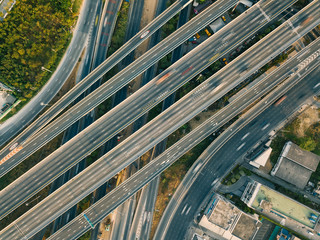 Fototapeta na wymiar Aerial view of highway and overpass in city