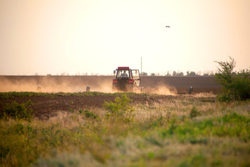 Fototapeta premium Sowing and plowing action in the spring season