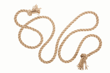 long jute rope with curls and knots isolated on white