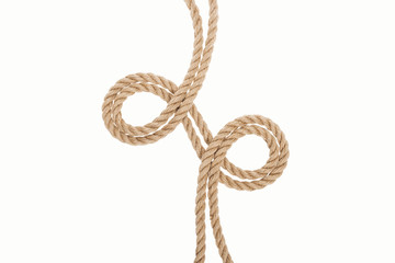 curled brown and jute ropes isolated on white