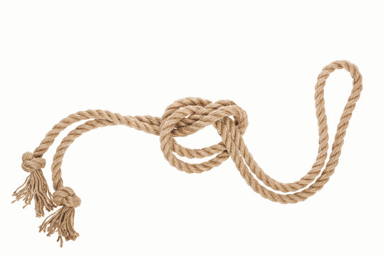 nautical jute rope with sea knot isolated on white