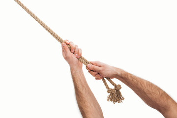 cropped view of man holding jute brown ropes in hands isolated on white