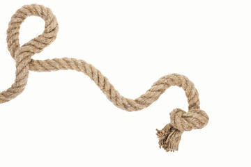 thick jute and brown rope with knot isolated on white