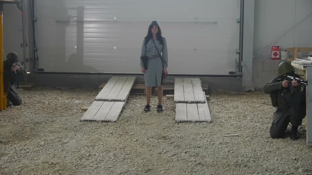 Cold War - Female officer in warehouse