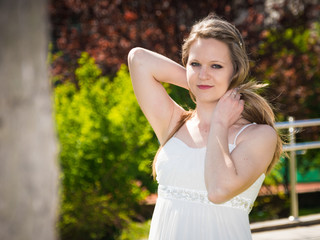 a beautiful girl in a white dress