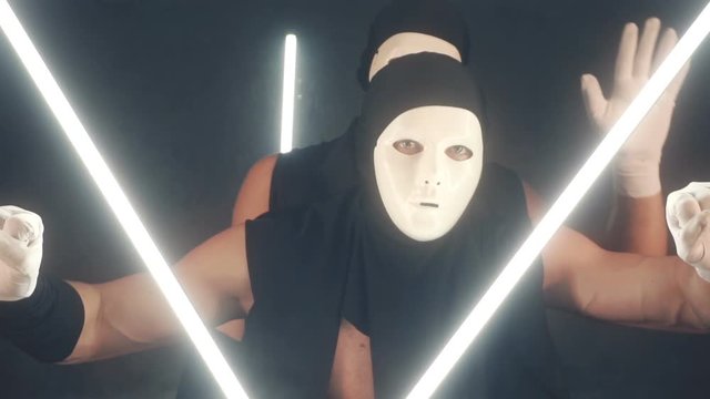 Men in white masks